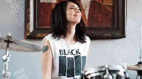 -3---kathleen-hanna-playing-the-drums.-photo-courtesy-of-allison-michael-orenstein_wide-85e15369ca3aa6f644dc72a1eb270345a5ba78e9-s6-c30
